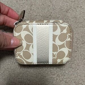 Coach Tan and Silver Patterned medicine holder